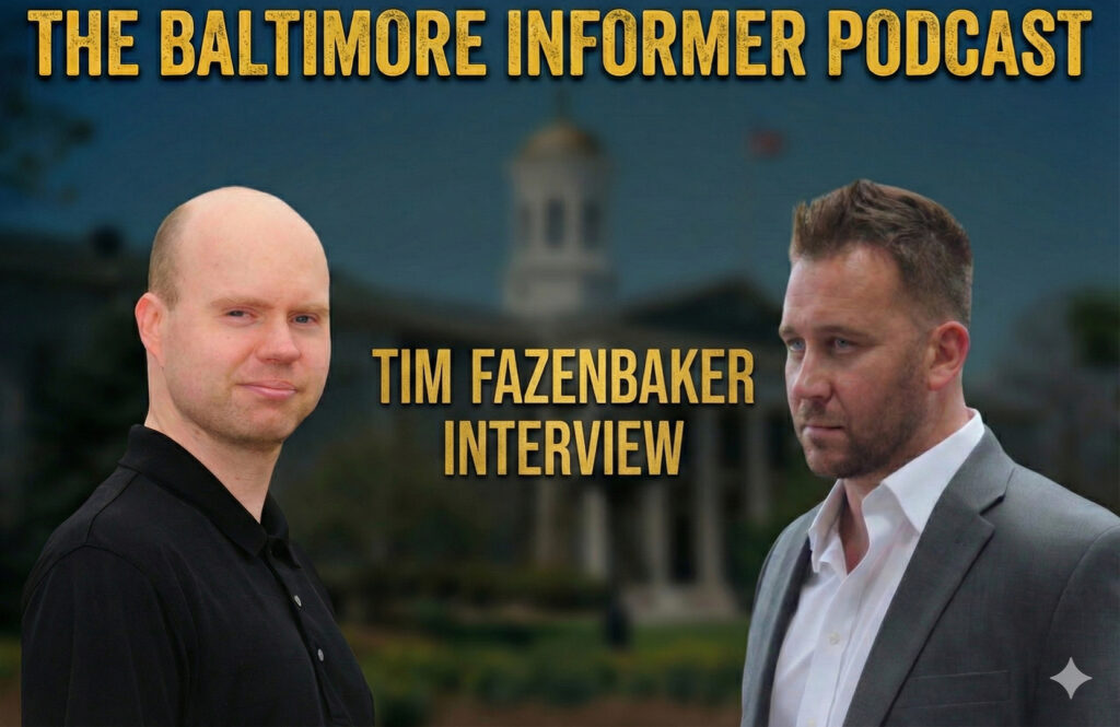 A podcast graphic titled "THE BALTIMORE INFORMER PODCAST" at the top in gold text. Below it, centered, is gold text reading "TIM FAZENBAKER INTERVIEW". On the left side is a bald man wearing a black polo shirt. On the right side is Tim Fazenbaker, wearing a grey suit and white shirt. The background is a blurred view of a large government building with a dome.